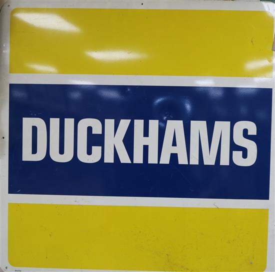 A Duckhams enamel sign 100 x 100cm